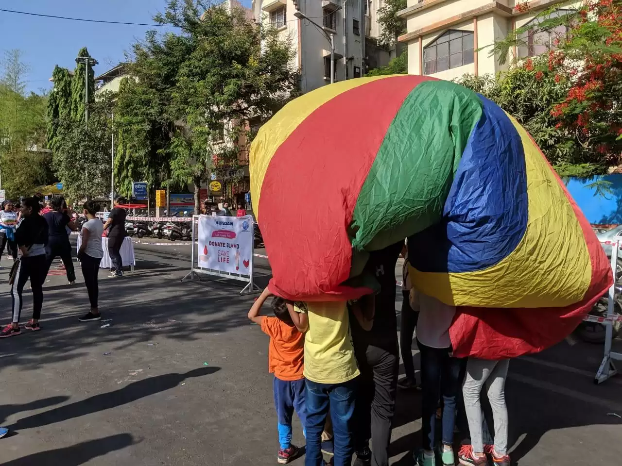 Children indulged in playing with their parents at Pune Street Fest