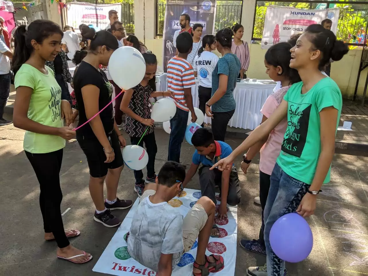 Children indulged in playing with their parents at Pune Street Fest