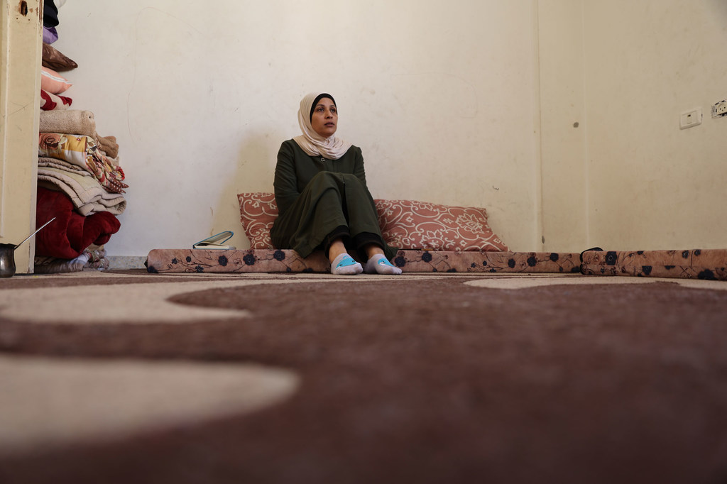 Hala, a displaced mother and humanitarian worker, fled her home in Gaza to stay in Rafah.